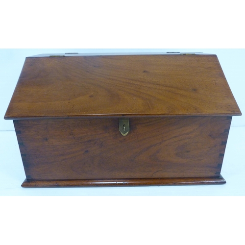 395 - Victorian mahogany stationery box with hinged sloping front cover enclosing fitted compartments, 23.... 