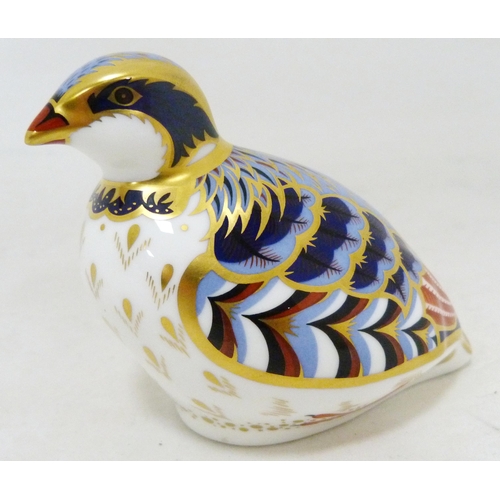 321 - Two Royal Crown Derby animal paperweights modelled as a red legged partridge and a crested tit, larg... 