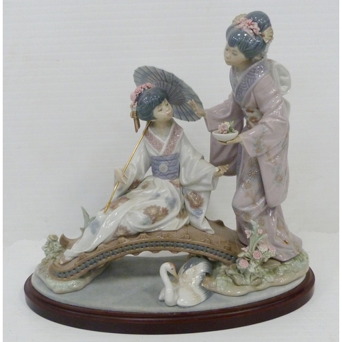 325 - Lladro figure group, 'Springtime in Japan', sculpted by Salvador Debon, modelled as two Geisha girls... 