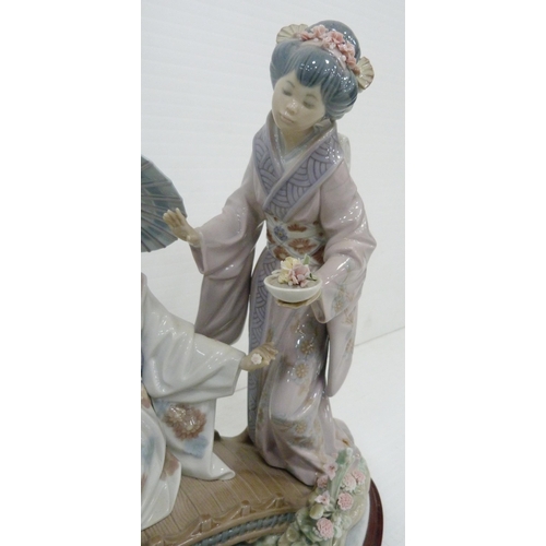 325 - Lladro figure group, 'Springtime in Japan', sculpted by Salvador Debon, modelled as two Geisha girls... 