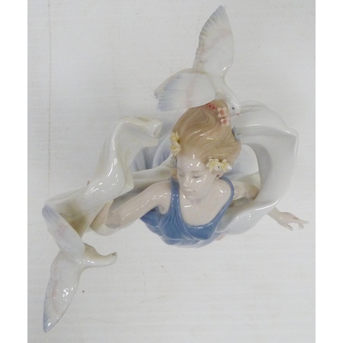 327 - Lladro Inspiration Millennium figure, 'New Horizons', 1999, impressed no. 6570 to base, 38cm high, w... 