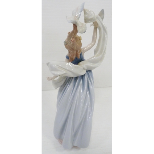 327 - Lladro Inspiration Millennium figure, 'New Horizons', 1999, impressed no. 6570 to base, 38cm high, w... 