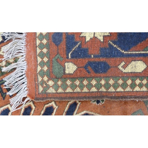 500 - Turkish Kurdish-style hand-knotted rug decorated with assorted geometric motifs, adorned with animal... 