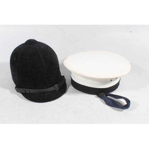 134 - Sailors white flat cap and a riding hat. (2)