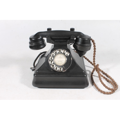 16 - Vintage black Bakelite telephone.