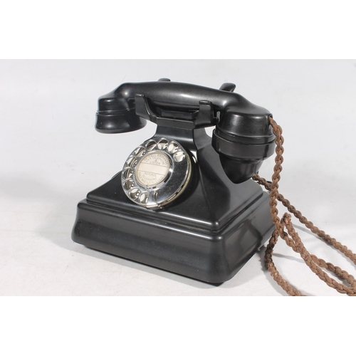 16 - Vintage black Bakelite telephone.