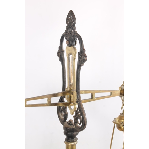 2 - Victorian brass and cast iron shop balance scales, 82cm high.