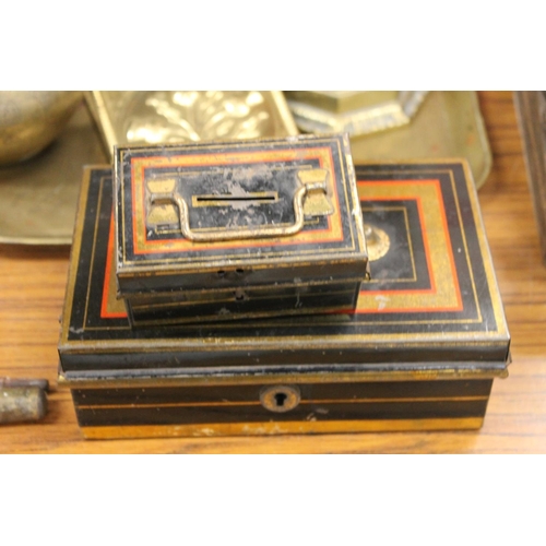 202 - Indian brass pot, antique brass pricket candlestick, wall letter rack and two cash tins.