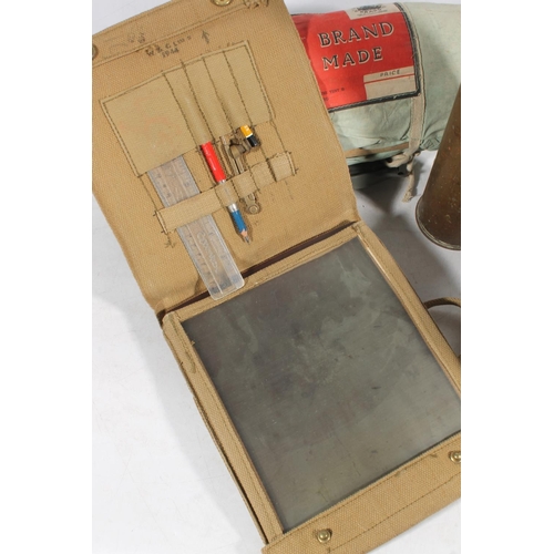 204 - Militaria items to include a aluminium mess tin, shell casing, canvas map case and a Staffordshire t... 