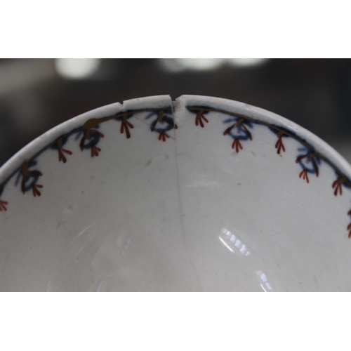 213 - English 18th century tea bowl and saucer.