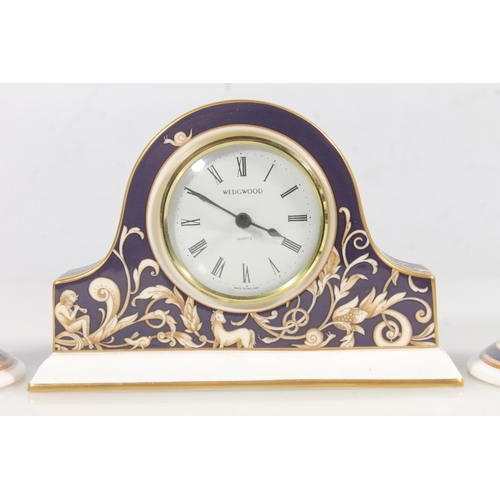 217 - Wedgwood Cornucopia clock garniture, largest 10.5cm high.