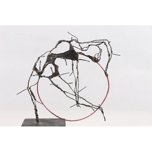 220 - Modernist wirework sculpture 'The Red Hoop' on pedestal base, 21cm high.