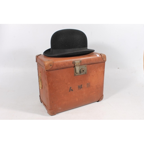 25 - Lock & Co. of London bowler hat, with leather case.