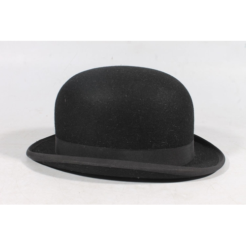 25 - Lock & Co. of London bowler hat, with leather case.