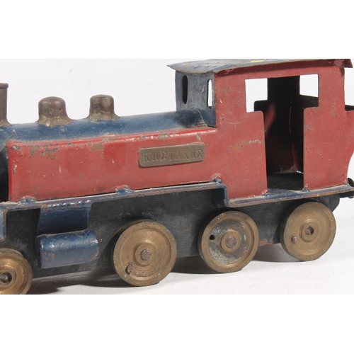 264 - Continental painted tin plate train model with Russian or Greek Cyrillic inscription to the side, to... 