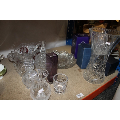 303 - Glassware to include large cut glass vase, cut glass fruit bowl, Edinburgh Crystal, etc.