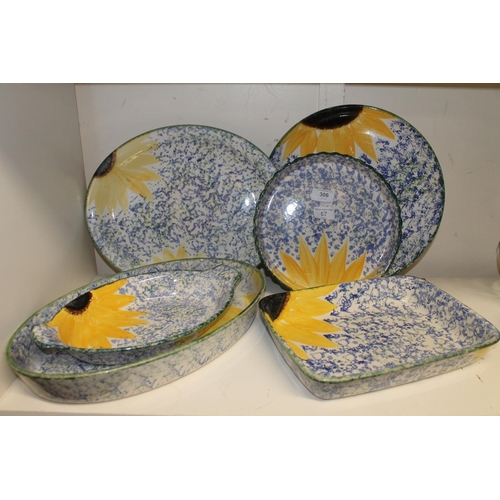 306 - Poole Pottery Vincent Sunflower sponge decorated serving and oven ware to include lasagne and quiche... 