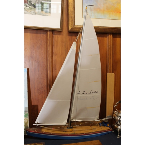 31 - Wooden painted pond yacht with sails, height from base of the hull to top of sails 110cm.