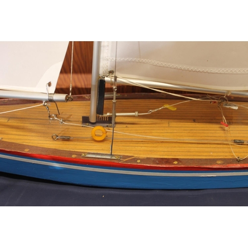 31 - Wooden painted pond yacht with sails, height from base of the hull to top of sails 110cm.