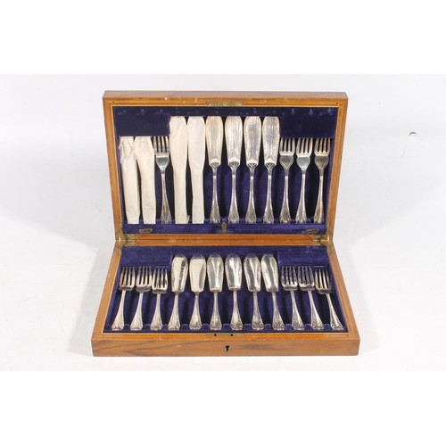 32 - Cased canteen of twelve fish knives and forks.