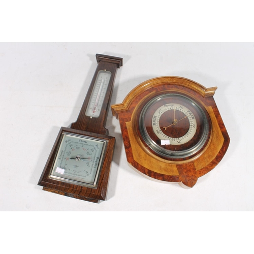 34 - Two wood framed barometers.