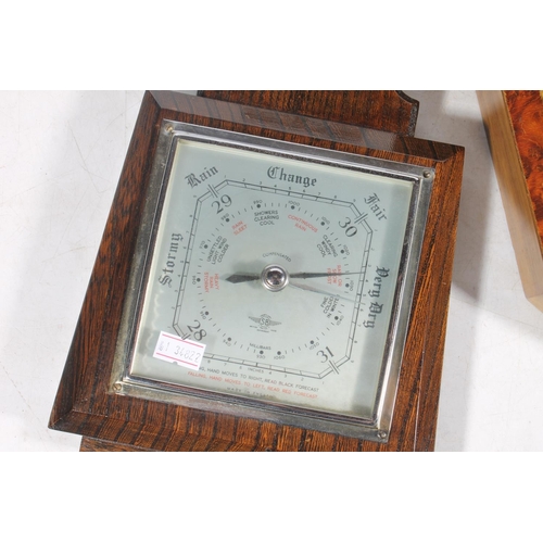 34 - Two wood framed barometers.