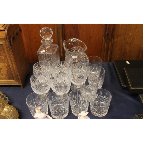 39 - Cut-glass decanters, tumblers, etc.