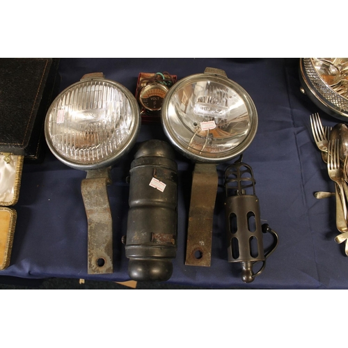 45 - Lucas lamps, a voltmeter etc.