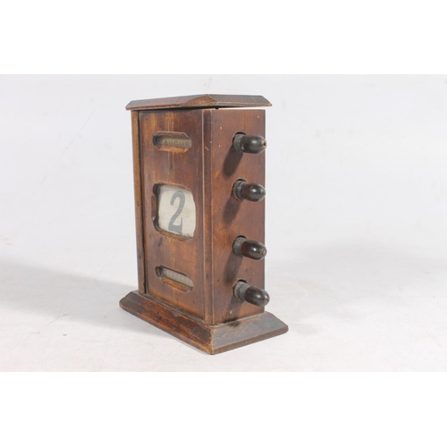 5 - Oak cased perpetual calendar, 15.5cm high.