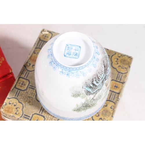 52 - Oriental porcelain blue and white bowl, and a similar beaker, both boxed.