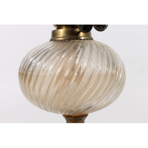 72 - Glass and brass oil lamp, 58cm high.