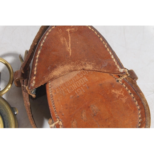 9 - French & Son WWI period marching compass, in leather case.