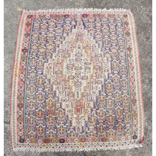 917 - Oriental cream ground geometric rug, 143cm x 126cm.