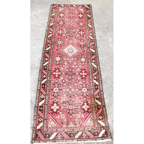 924 - Persian red ground runner, 292cm x 97cm.