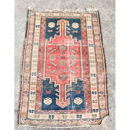 926 - Persian blue ground and polychrome geometric motif rug, 155cm x 103cm.