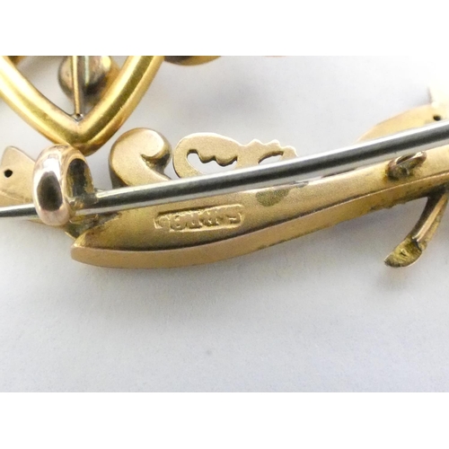 77B - A 9ct gold bar brooch one with central wishbone, along with a yellow metal curb link heart broo... 