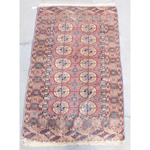 937 - Turkoman Tekke rug with double column of lozenges on red ground, 166cm x 103cm.