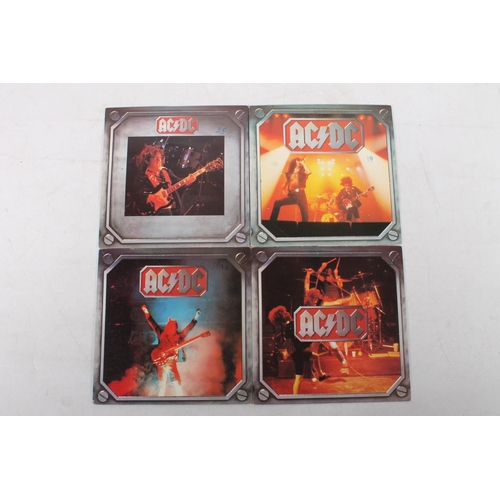 398 - Set of four AC/DC picture sleeve singles on HM series.