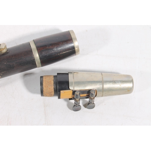 425 - Lucian Bassi clarinet, retailer J.Heyworth and Sons.