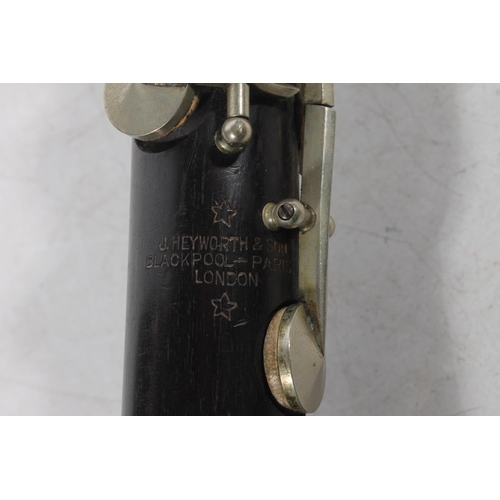 425 - Lucian Bassi clarinet, retailer J.Heyworth and Sons.