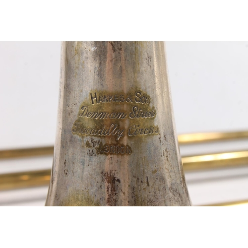 432 - Hawkes and Sons cased trombone.