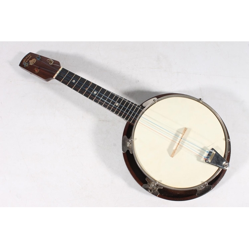 434 - Melody Junior cased banjo.