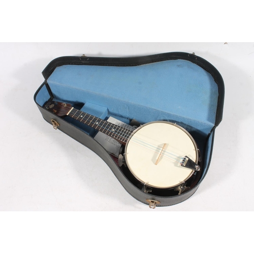 434 - Melody Junior cased banjo.