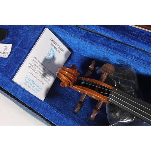 436 - Stentor Student I violin and bow in fitted case.