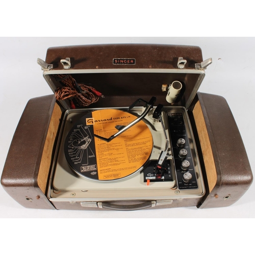 445 - Singer record player with speakers to either side on Garrard deck.