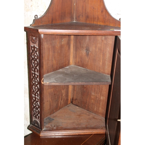 854 - Small mahogany carved corner cabinet.