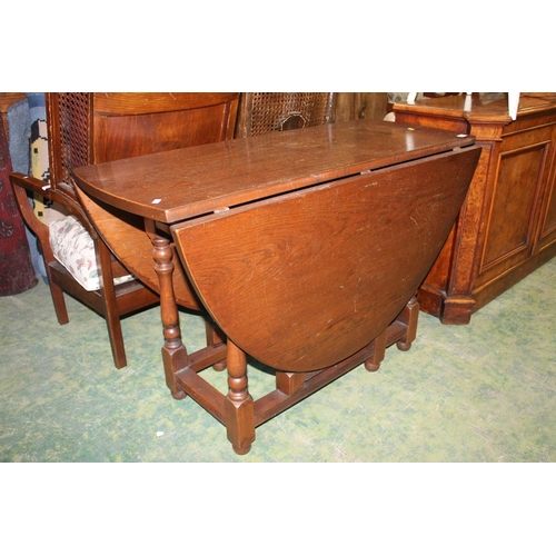 864 - Oak drop leaf table