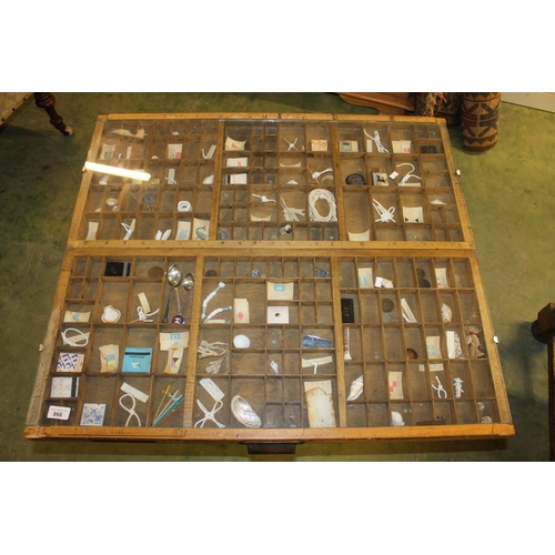 866 - Glazed printers letter display tray converted to a table containing shells and other curios.