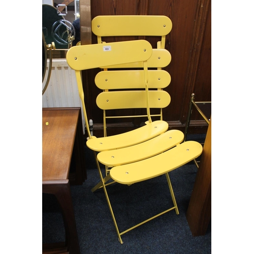 884 - Pair of yellow folding metal chairs.