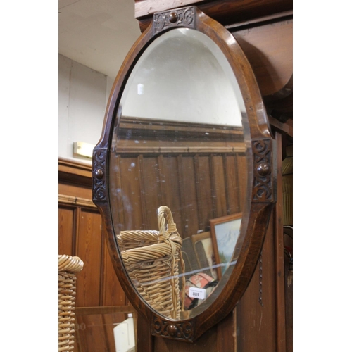 889 - Oak framed wall mirror.